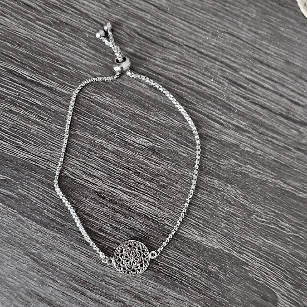 Elegant Silver Bracelet with Intricate Design